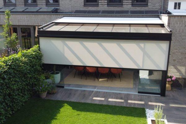 Semi-enclosed awning on a veranda with a glass roof
